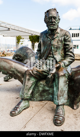 A bronze sculpture of Jules Verne, a French author who pioneered the science fiction genre.. Vigo Spain Stock Photo