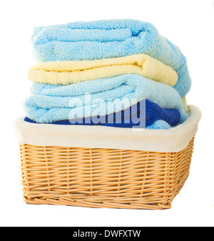 Pile of washed towel in basket Stock Photo