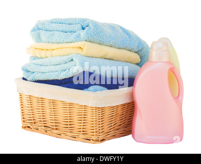Clothes with detergent in basket Stock Photo