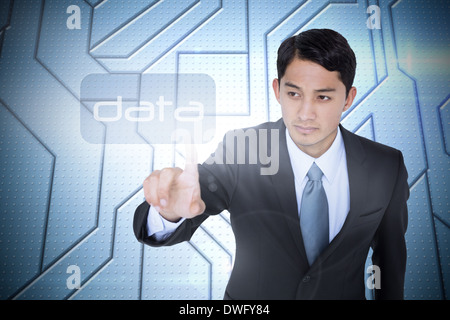 Data against circuit board on futuristic background Stock Photo