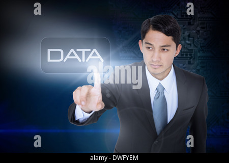 Data against futuristic background with circuit board Stock Photo