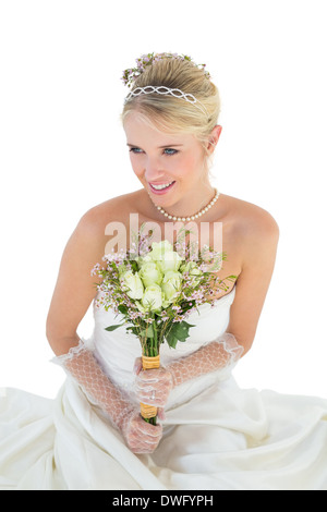Thoughtful bride over white background Stock Photo