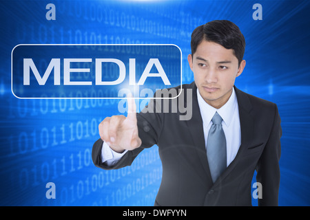 Media against futuristic shiny binary code Stock Photo