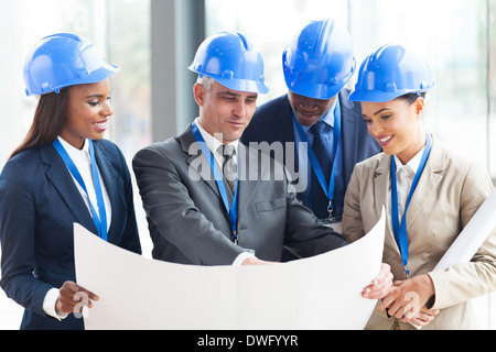 group of professional architects discussing project Stock Photo