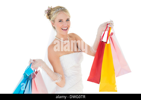 Bride holding shopping bags over white background Stock Photo