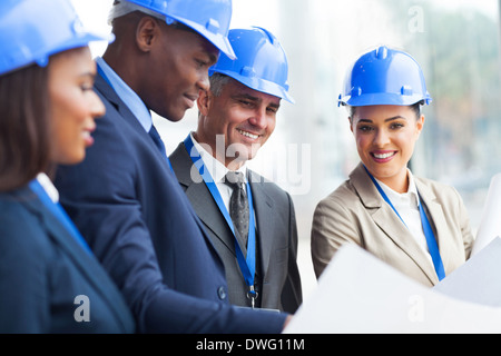 professional senior construction manager working with team Stock Photo
