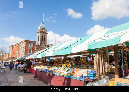 Outdoor market stalls at Chesterfield Market with the Market Hall in the distance. Market Place, Chesterfield, Derbyshire, England, UK Stock Photo