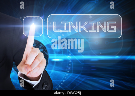 Businesswomans finger touching Linking button Stock Photo