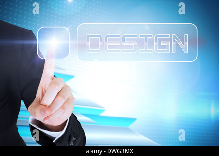 Businesswomans finger touching Design button Stock Photo