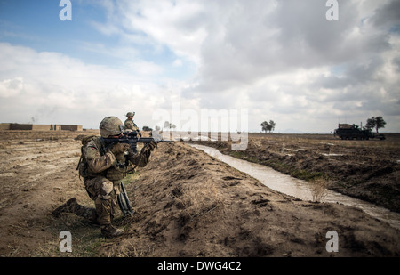 US Army soldiers during a reconnaissance patrol as part of Operation Alamo Scout February 12, 2014 in Kandahar province, Afghanistan. Stock Photo