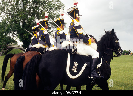 12th Regiment of Light Dragoons with sabres drawn, c. 1815, historical re-enactment British army soldier soldiers cavalry uniform uniforms sabre horses horse England UK as deployed at Battle of Waterloo Stock Photo