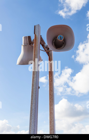 Looking up at Atlas Soundolier public address system (P A system) loudspeakers, England, UK Stock Photo