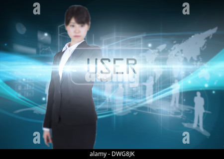 User against abstract glowing black background Stock Photo