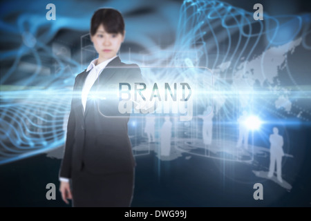 Brand against abstract glowing black background Stock Photo