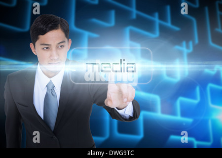 Media against shiny lines on black background Stock Photo
