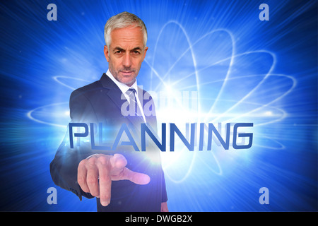 Planning against shiny futuristic sphere Stock Photo
