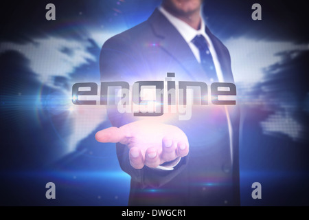 Engine against glowing world map on black background Stock Photo