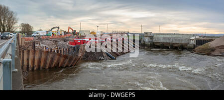 Bridgwater, Somerset, UK.  7th March, 2014. Panorama of eight high capacity Dutch pumps transferring water from King's Sedgemoor Drain into the River Parrett at Dunball Wharf, Bridgwater on March 7, 2014. These Van Heck pumps were installed as a temporary measure by the Environment Agency to remove flood water from across the Somerset Levels and depositing it out to sea. The Levels have suffered the worst flooding in living history. Credit:  Nick Cable/Alamy Live News Stock Photo