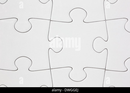Close Up On Blank, White Jigsaw Puzzle Pieces. One Piece Is Removed, To The  Side Stock Photo, Picture and Royalty Free Image. Image 140669821.