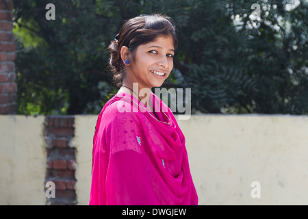 1 Indian Rural girl Standing at home Stock Photo