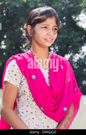 1 Indian Rural girl Standing at home Stock Photo