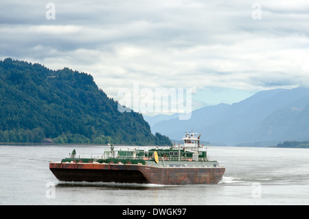 A Barge moving through the Columbia River Gorge Stock Photo