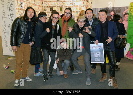 New York, USA. 06th Mar, 2014. Members of the art collective 'Double fly arts center' from Beijing, Shanghai and Hangzhou during the art fair 'The Armory Show' in New York, USA, 06 March 2014. Photo: Felix Hoerhager/dpa/Alamy Live News Stock Photo