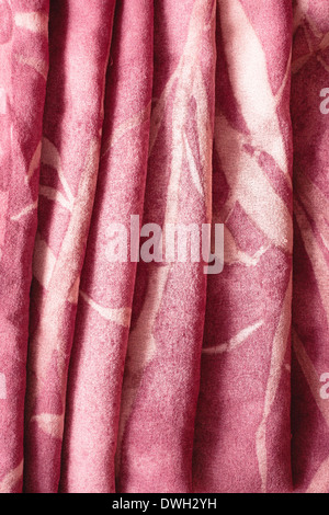 Folded pink cloth as a background image Stock Photo