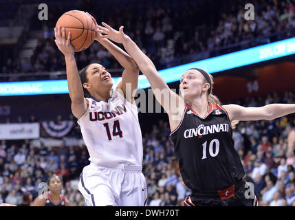 March 8, 2014 - Uncasville, CT, USA - Saturday March 8, 2014: UConn huskies guard Bria Hartley (14) drives to the basket against Cincinnati Bearcats guard Kayla Cook (10) during the 1st half of the American Athletic Conference womens basketball tournament game between Cincinnati and UConn at Mohegan Sun Arena in Uncasville, CT. Bill Shettle / Cal Sport Media. Stock Photo