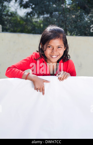 1 Indian Kid Standing with Message Board Stock Photo
