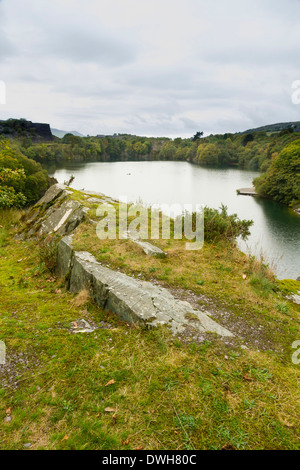 Looking across the disused Dorothea Slate Quarry, Nantlle, Gwynedd, Wales, United Kingdom. Flooded with water. Stock Photo