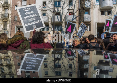 Paris, France. 8th March.  French  Feminist Groups, including The 8 Mars and Act Up Paris,  Protesting at International Women's Day Event, Crowd marching with signs on street, equality women, lgbt protest