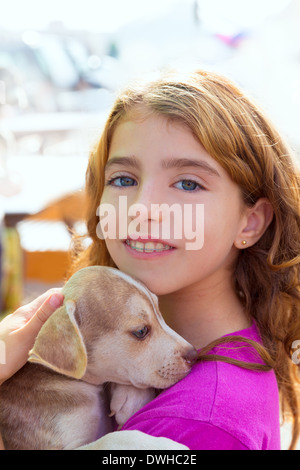 Kid girl smiling puppy dog and teeth braces smiling happy Stock Photo