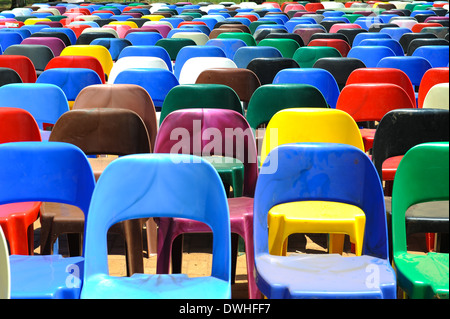 Colourful chairs in the sunshine. Stock Photo