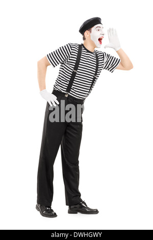 Full length portrait of a mime artist shouting Stock Photo