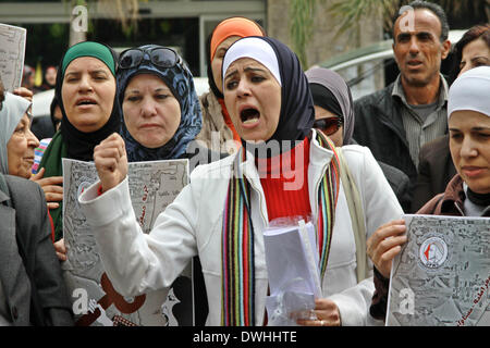 Nablus. 9th Mar, 2014. Palestinian women take part in a protest calling for boycott on Israeli products made in the settlements area in the West Bank city of Nablus on March 9, 2014. © Nidal Eshtayeh/Xinhua/Alamy Live News Stock Photo