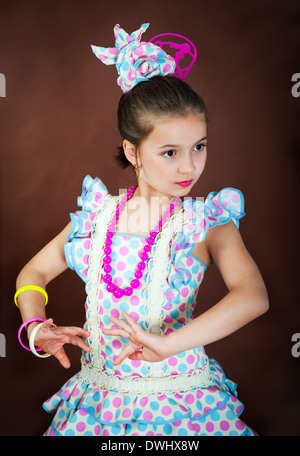 Beautiful girl in national dress dancing flamenco Stock Photo