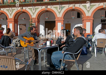 Corredera square, Young people and flamenco guitar, Cordoba, Region of Andalusia, Spain, Europe Stock Photo