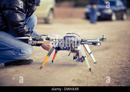 Quadrocopter drone ready to takeoff Stock Photo