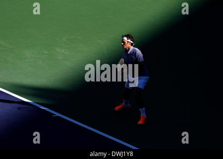 Indian Wells, California, USA. 08 March, 2014: Roger Federer of Switzerland in action against Paul-Henri Mathieu of France during the BNP Paribas Open at Indian Wells Tennis Garden in Indian Wells CA./Alamy Live News Stock Photo
