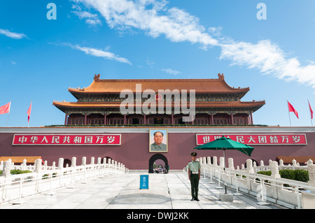 A Chinese officer stands guard outside of Tiananmen Gate in Beijing, China. Stock Photo