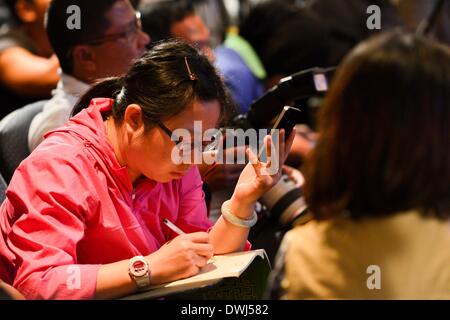 Kuala Lumpur, Malaysia. 10th Mar, 2014. A press conference is held by the Department of Civil Aviation of Malaysia in Kuala Lumpur, capital of Malaysia, March 10, 2014. Malaysia has yet to verify reports that Vietnamese rescue planes had spotted a part of the missing Malaysia Airlines jet with 239 people on board, Director General of the Department of Civil Aviation of Malaysia Azharuddin Abdul Rahman told the press conference on Monday. Credit:  Chong Voon Chung/Xinhua/Alamy Live News Stock Photo