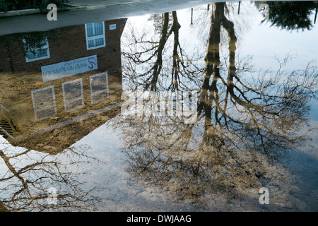 Flooded Chalfont St Giles public car park Bucks UK Stock Photo