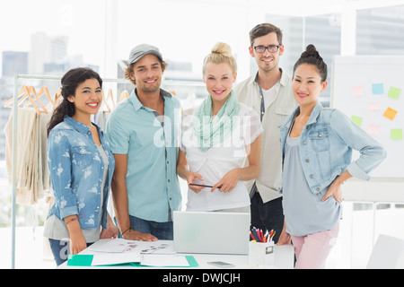 Fashion designers using laptop Stock Photo
