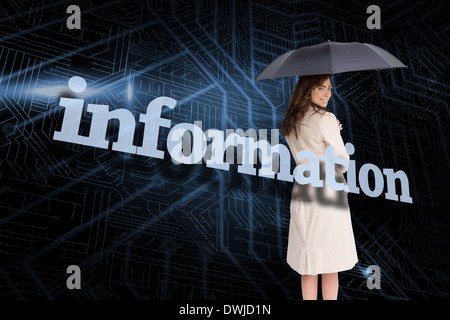 Businesswoman holding umbrella behind the word information Stock Photo