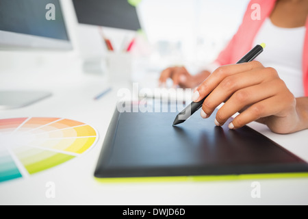 Mid section of a photo editor using graphics tablet Stock Photo