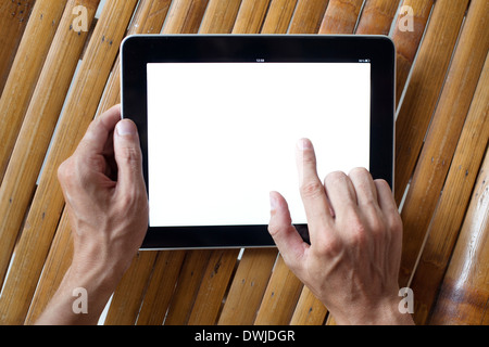 hands holding tablet Stock Photo