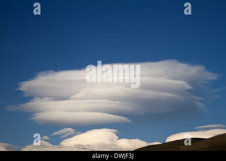 Lenticular clouds formed over Parnassos mountain (Greece) Stock Photo
