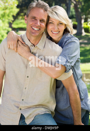 Loving couple spending time together in park Stock Photo