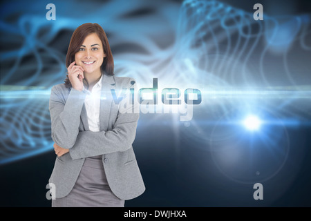 Video against abstract glowing black background Stock Photo